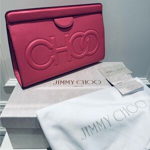 Brand new JIMMY CHOO Logo Embossed Pebbled Leather Clutch